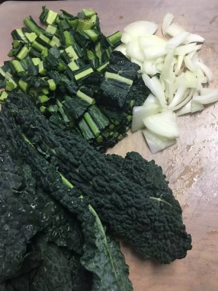 chopped onion and kale