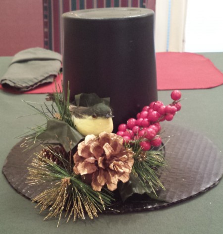 same decoration with the addition of a sprig of faux red berries