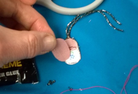 backing fabric has been cut to cover the entire back