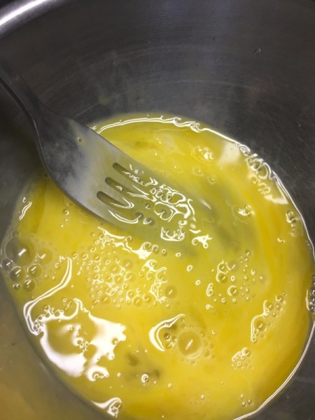 beating egg with fork