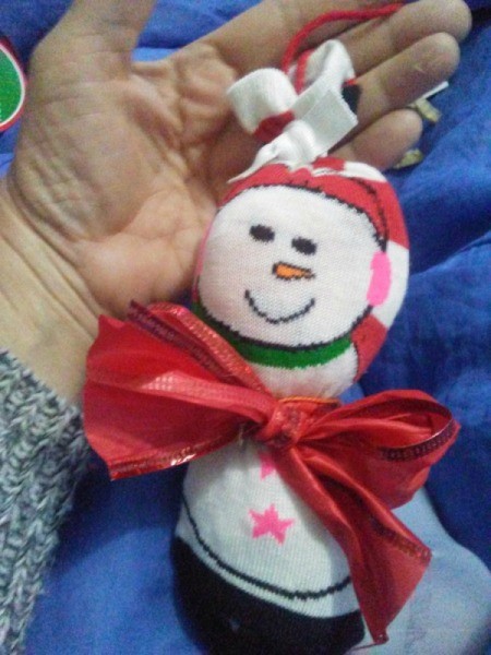 closeup of snowman sock ornament