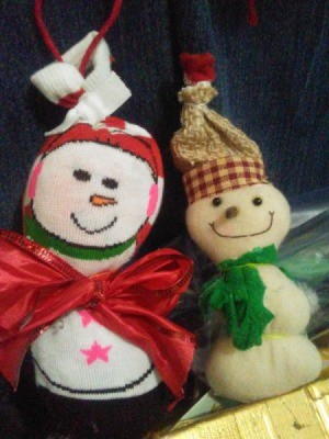 two finished snowmen ornaments