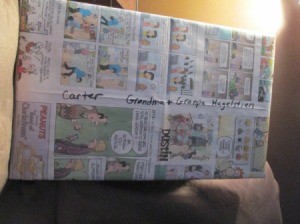 A present wrapped in comics from the paper.