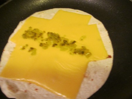 tortilla cheese & pickle relish in pan