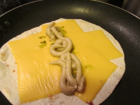 tortilla, cheese relish & hummus in pan