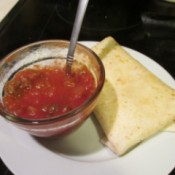 folded melt on plate with salsa