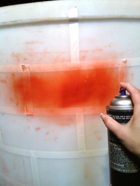 spray painting the fireplace prop