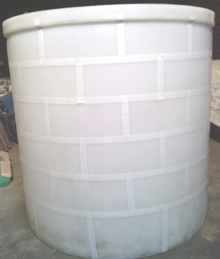cylinder with all of the tape applied to mark bricks