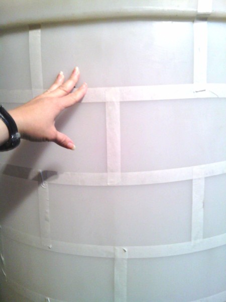 hand applying the tape for brick pattern