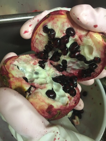 Pomegranate Deseeding - Splitting a pomegranate in half.