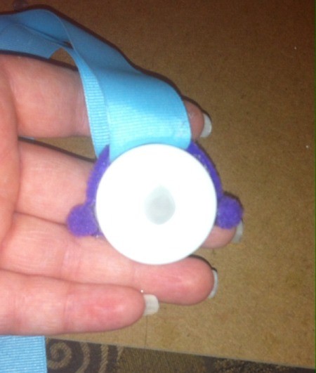 earmuff pom poms added and all glued in place