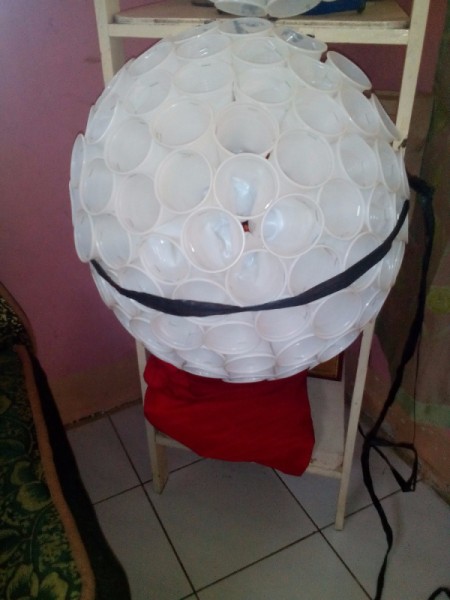 larger half sphere anchored to a shelf for support