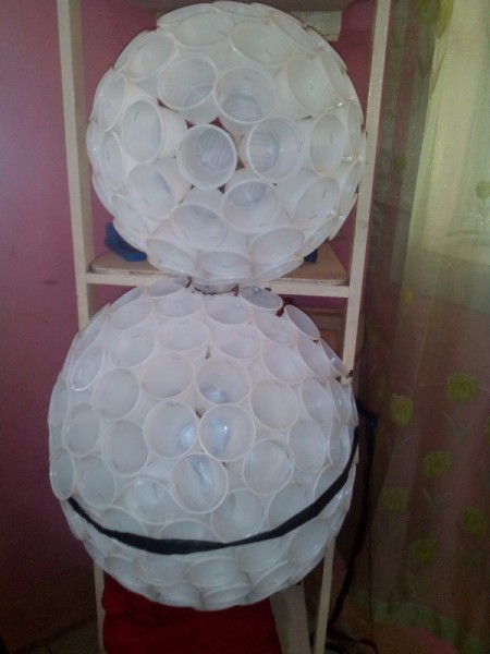 the two half spheres attached to the multilevel shelf