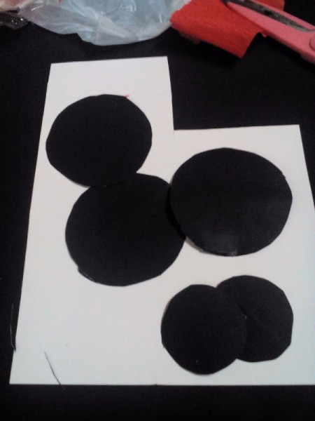 black paper circles for the eyes and buttons