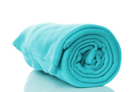 A green-blue fleece blanket.