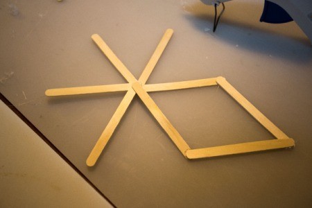 A "v" added to the center starburst.