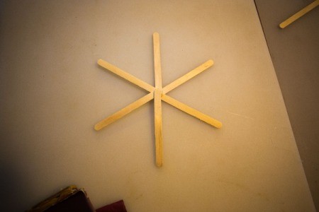 Popsicle sticks as a center starburst.