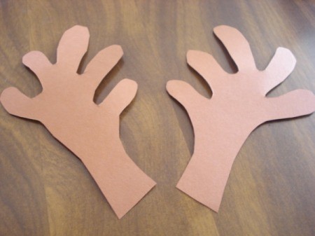 Two brown paper antlers for the reindeer bag.