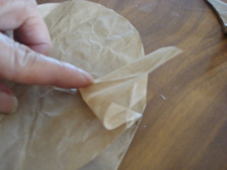 Folding reindeer bag ears.