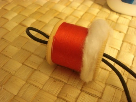 Spool Santa Ornament - push folded black string through middle of spool