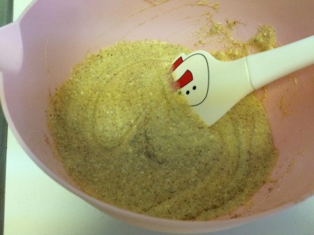 Sugar and spices added to liquid ingredients in bowl.