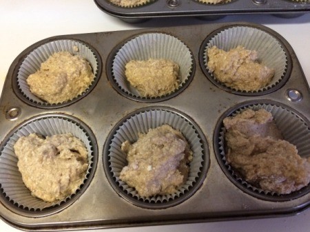 Muffins in tin papers ready to bake