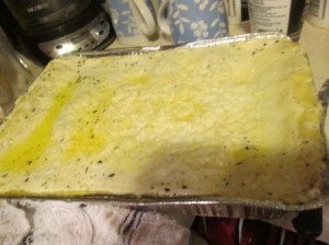 Alfredo Spinach Lasagna filled and baked foil pan.