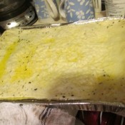 Alfredo Spinach Lasagna filled and baked foil pan.