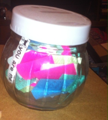 Blessings Jar for the New Year - plastic jar filled with colorful paper slips