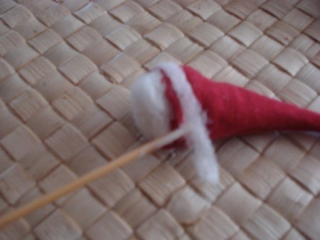 Spool Santa Ornament - adding a thin strip of cotton around the bottom of the hat