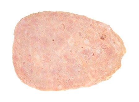 A canned ham on a white background.