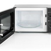 A microwave oven with a glass turntable tray.