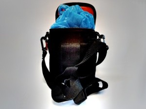 A camera case stuffed with grocery bags to retain it's shape while stored.