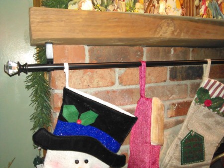 Curtain Rod For Hanging Christmas Stockings - closeup of stockings hanging on rod