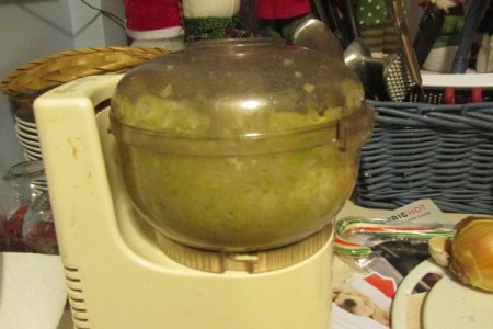food processor mincing vegetables.