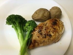 chicken breast, potatoes and broccoli on plate