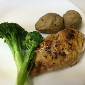 chicken breast, potatoes and broccoli on plate