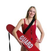 A lifeguard holding a flotation device.