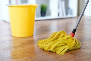 Mopping a hardwood floor.