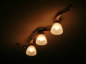 Dim ceiling lights.