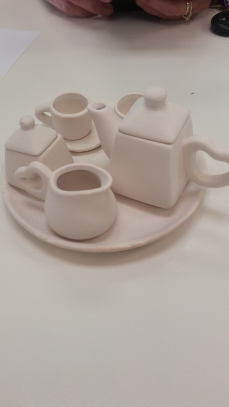 Unpainted pottery tea set, ready for glazing.