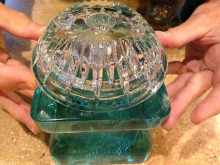 Thriftstore Glass Garden Tower - aligning the larger clear glass candleholder on top of the large blue base