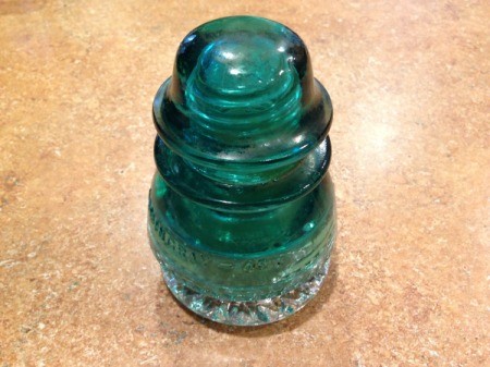 Thriftstore Glass Garden Tower - insulator atop the candleholder