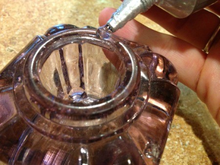 Thriftstore Glass Garden Tower - adding glue to the top edge of the purple candleholder