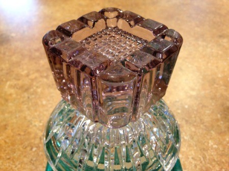 Thriftstore Glass Garden Tower - closeup of the inverted purple candleholder on top of the larger clear candleholder