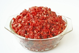 Mixing Ground Meat With Venison - glass bowl with filled with minced venison