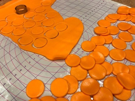 'Sharky' Goldfish Birthday Cake - cutting out orange fondant scales