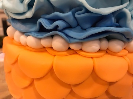 'Sharky' Goldfish Birthday Cake - create bubbles from white fondant and place around the bottom of the smaller cake, combining large and small balls