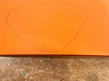 'Sharky' Goldfish Paper Lantern Decoration - draw a fin on the folded orange paper and cut out