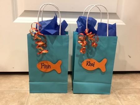 Goldfish Party Treat Bags - filled bags topped with dark blue tissue paper